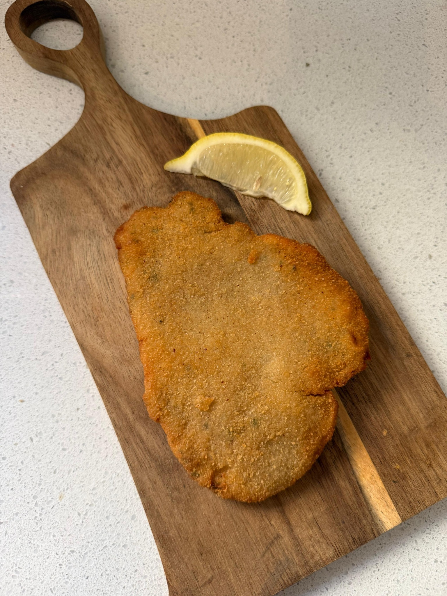 Milanesas CRANCH servidas con limón